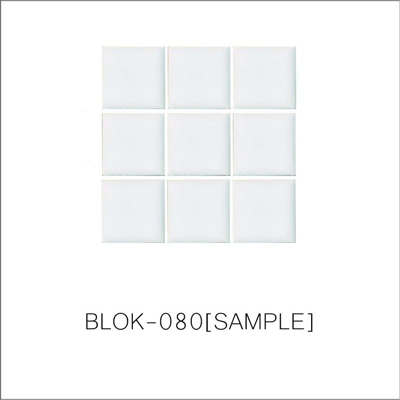 A sheet of square porcelain tiles in white color, arranged in a grid pattern.