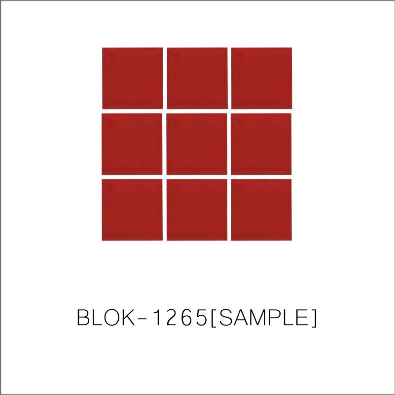 A sheet of square porcelain tiles in red color, arranged in a grid pattern.