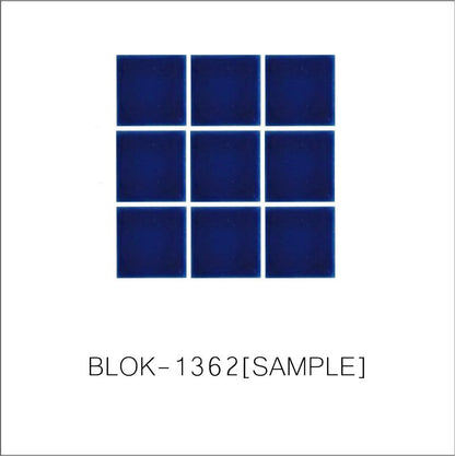 A sheet of square porcelain tiles in blue color, arranged in a grid pattern.