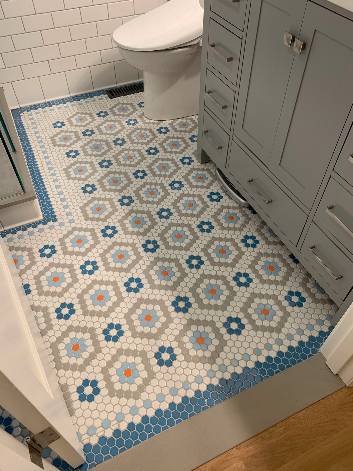 Custom Echo Rosette Pattern for residential bathroom floor