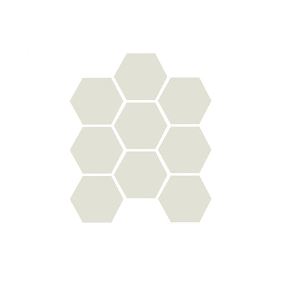 A sheet of unglazed porcelain hexagon tiles in gray color, arranged in a honeycomb pattern.