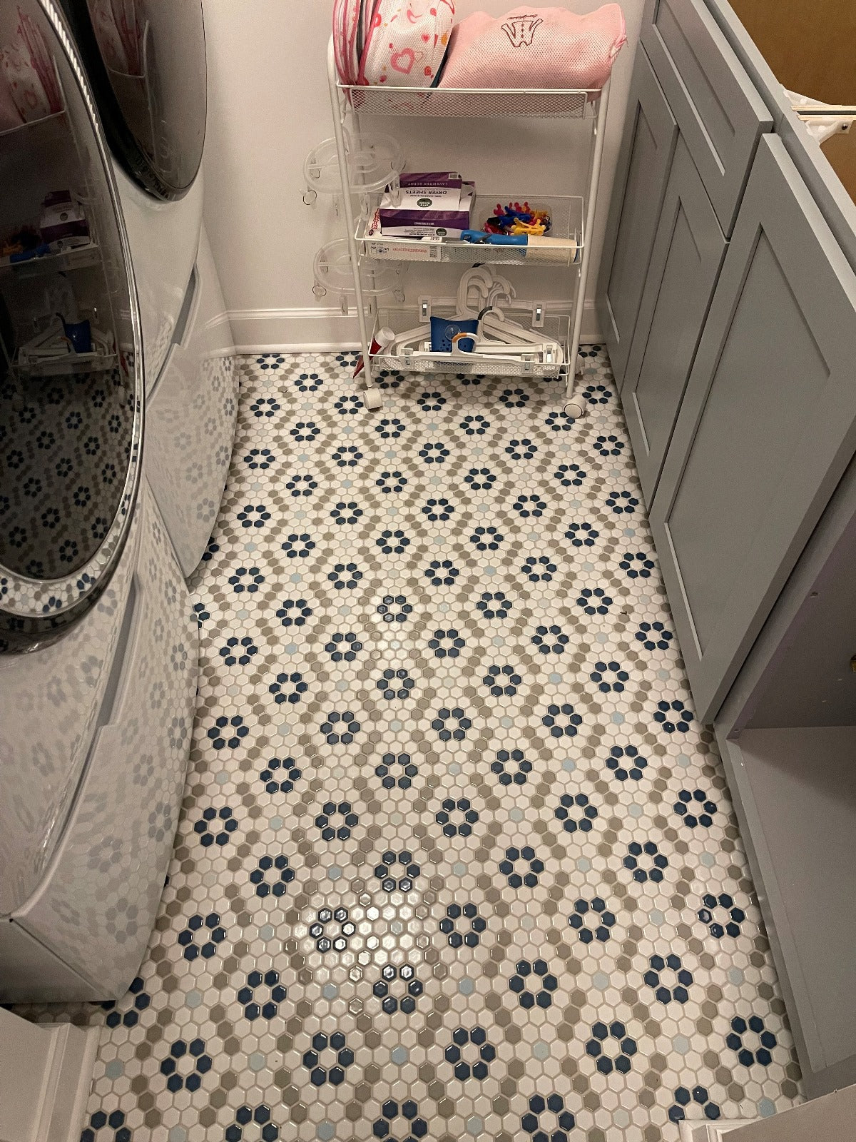 Residential laundry room floor in the Kismet Moira pattern.
