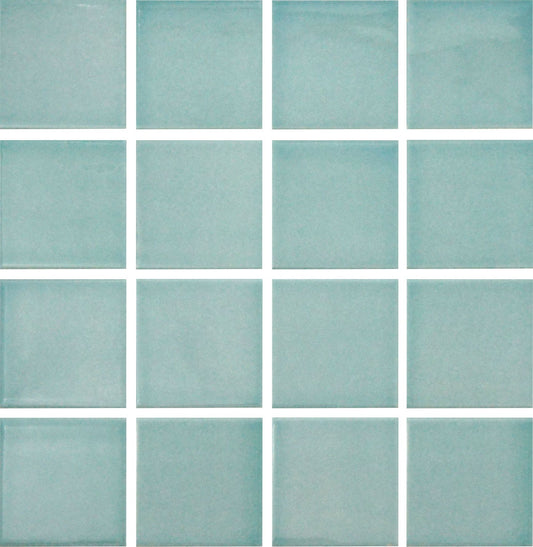 A grid of square glazed porcelain tiles in a light blue color.