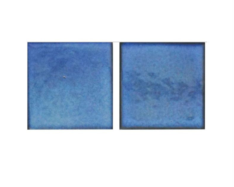Two blue rectangular tiles on a white background