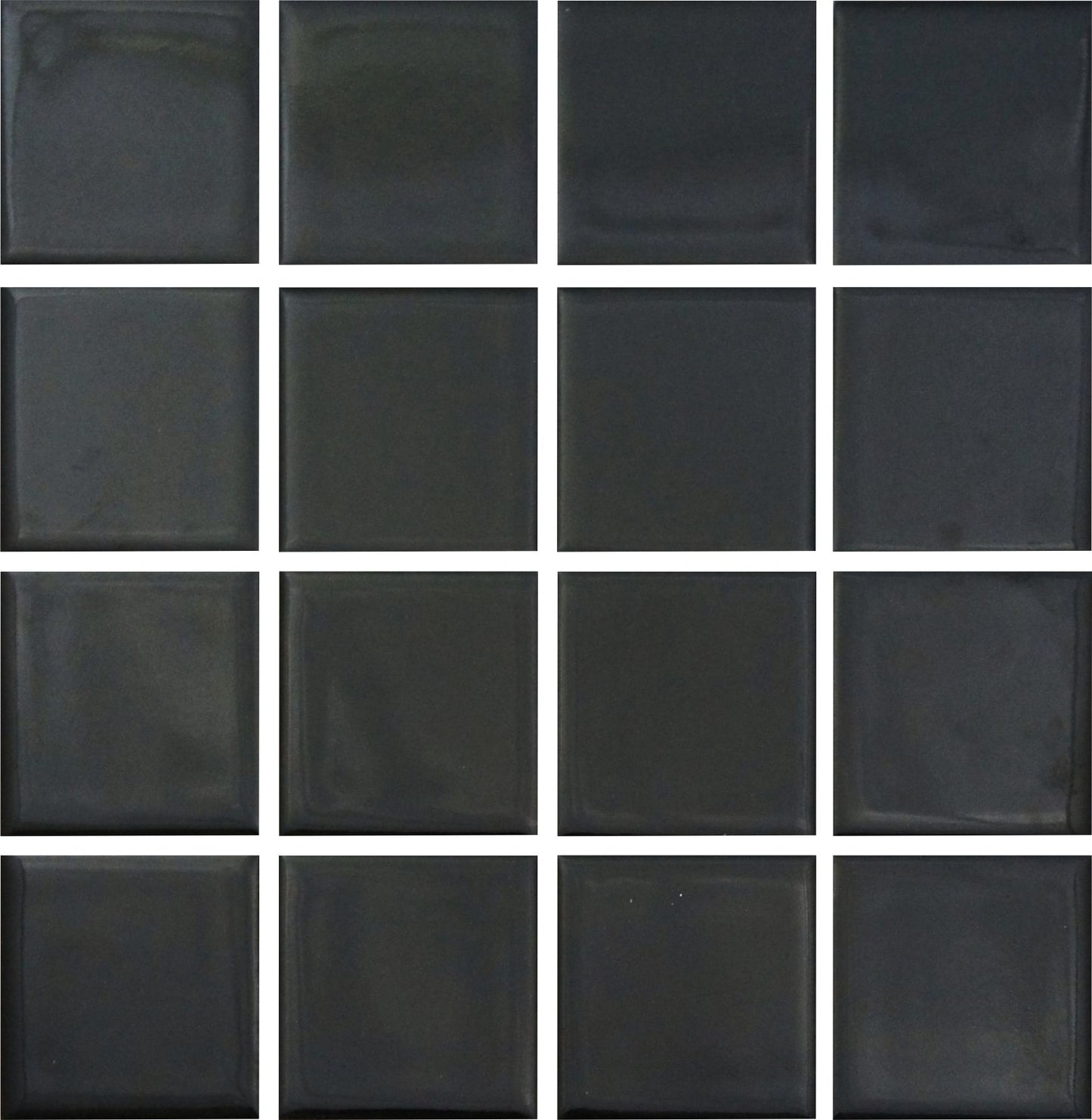 A grid of square glazed porcelain tiles in a black color.