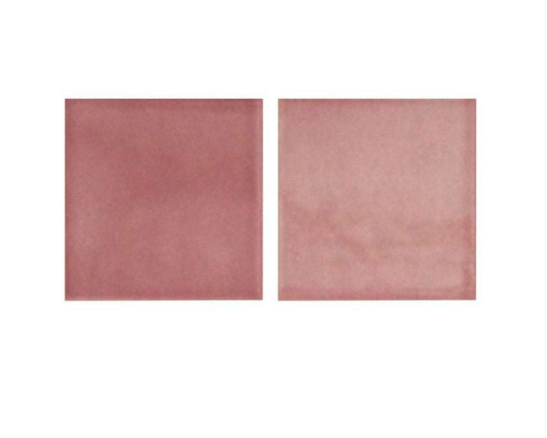 Two square tiles with a pinkish-brown color on a white background
