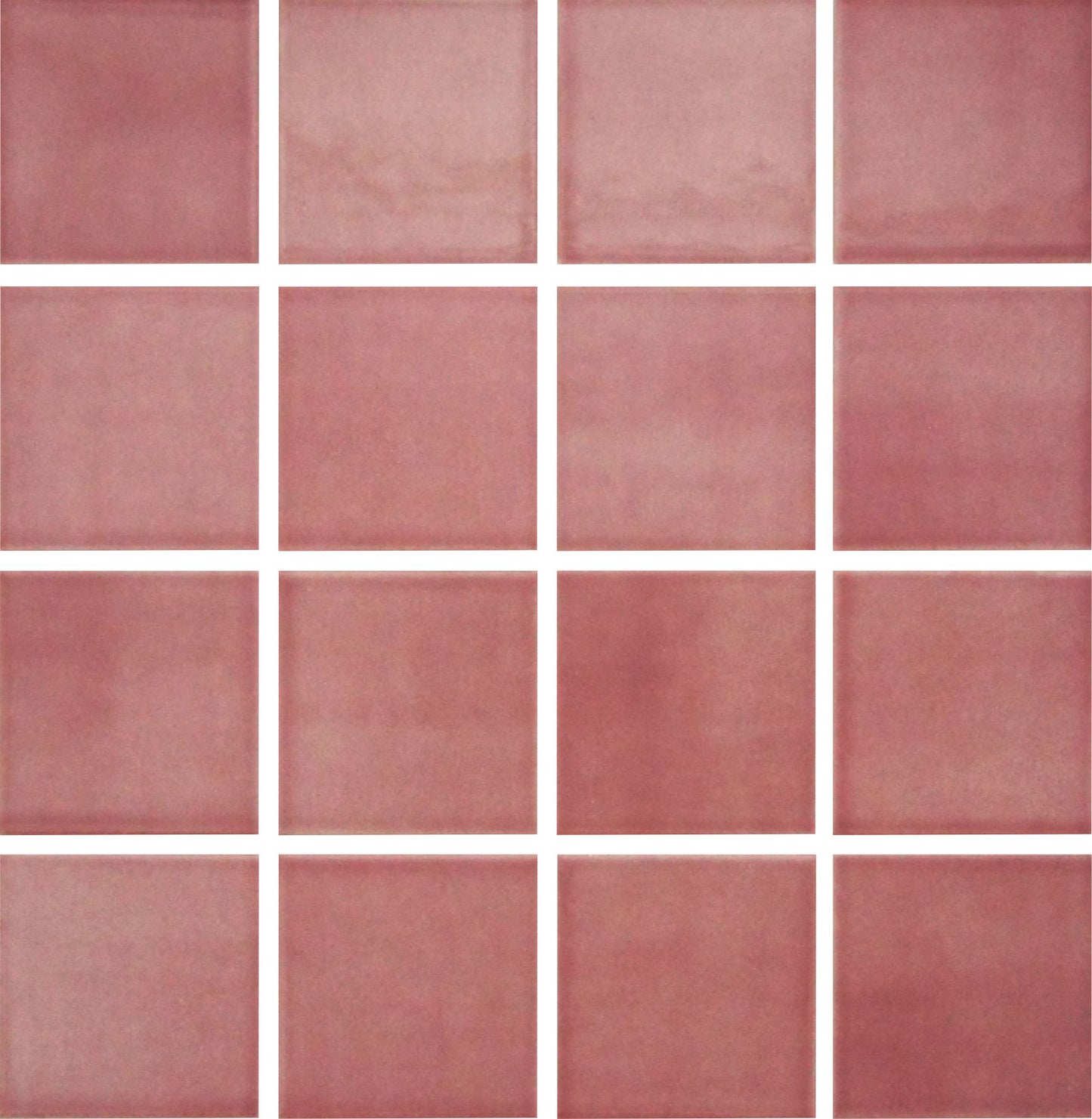 A grid of square glazed porcelain tiles in a light red color.