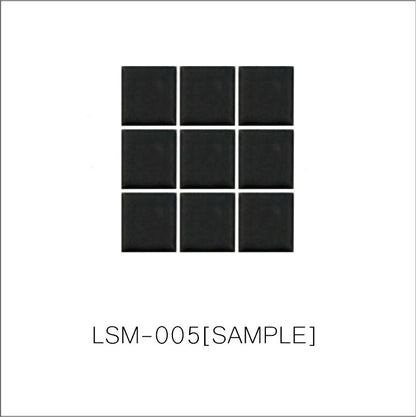 A sheet of square porcelain tiles with a glazed black finish, arranged in a mosaic pattern.