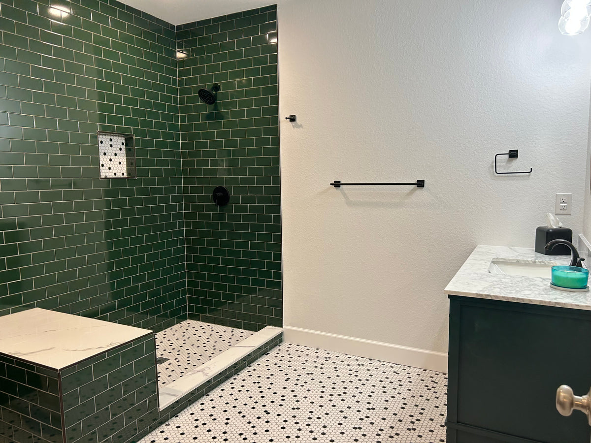 Brunswick Green Lyric NOW 3x6 Subway tile and Dots pattern in a residential shower surround.