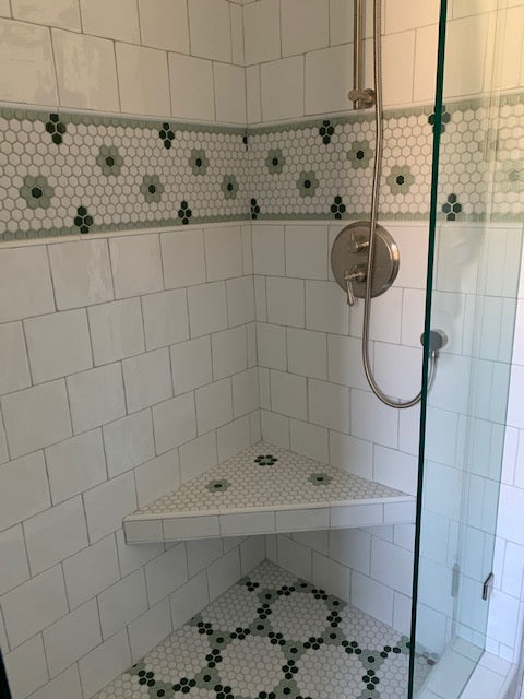 Custom Rosette and Quad Border for shower wall and Round and Round pattern for shower floor.