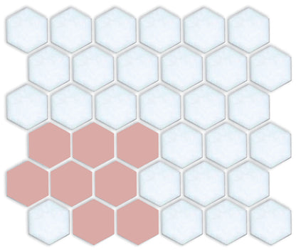 A pattern of porcelain hexagon tiles arranged in a corner pattern