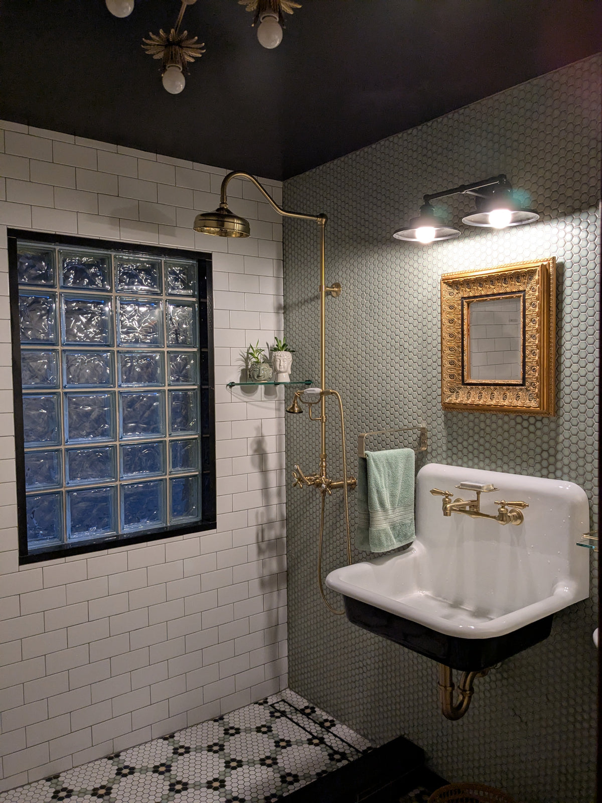 Celadon Green Lyric Modern Hexagons and Cloud White Lyric NOW 3x6 Subway Tile on residential bathroom walls