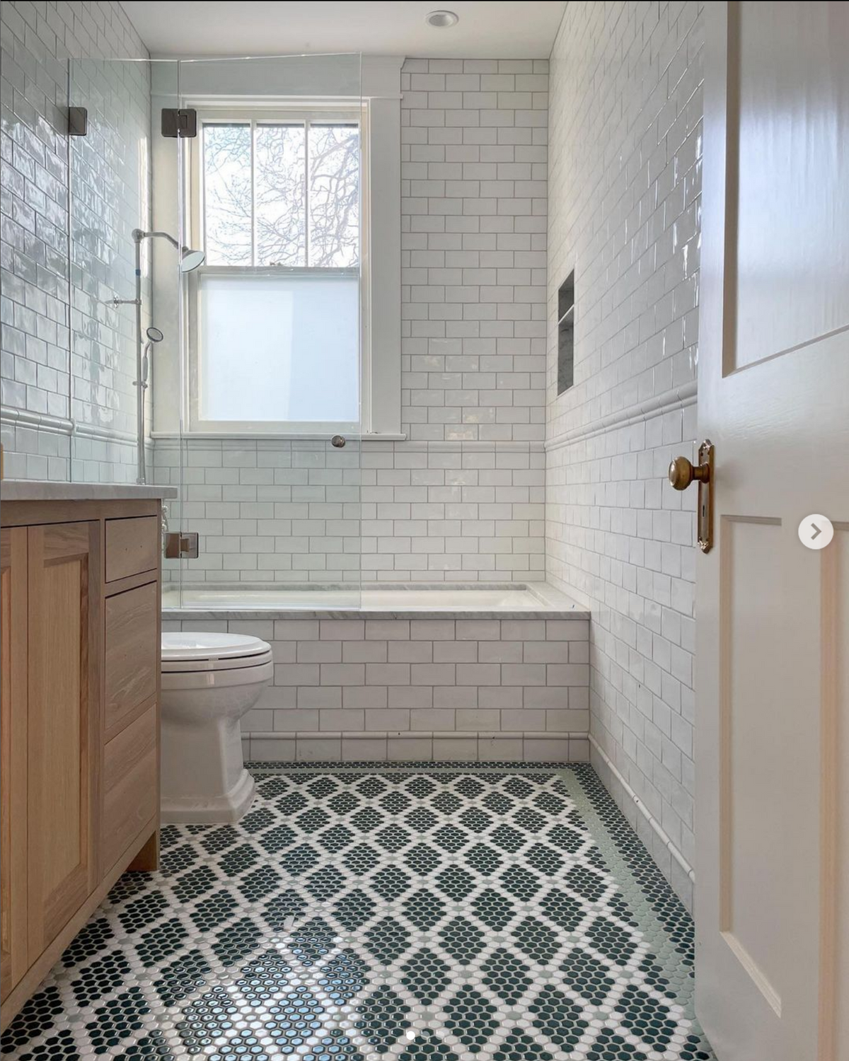 Pinnacle Hexagon Border and Rose and Trellis pattern in boarding house bathroom