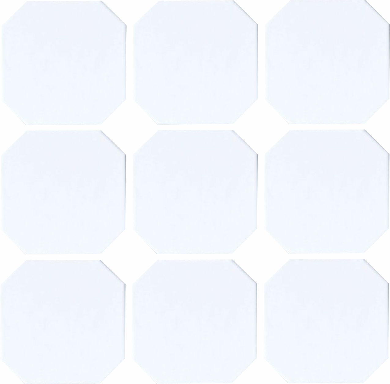 A collection of glazed porcelain octagon tiles in white color, arranged in a grid pattern.